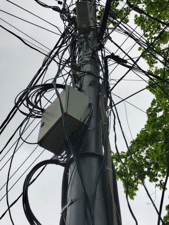 electricity post with many cables and wires in the city of Seoul, South Korea