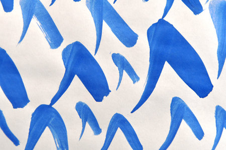 Abstract blue watercolor on white paper background. Hand drawn illustration.の写真素材