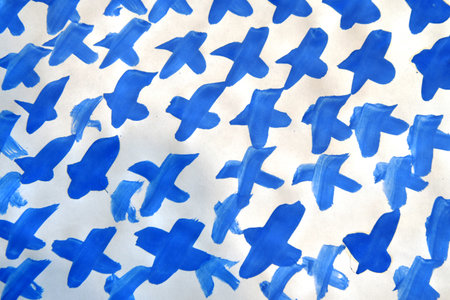 Texture, background, pattern. The pattern is blue with a design of birds. On a white backgroundの写真素材