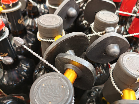 Close-up of a lot of black and brown dumbbells