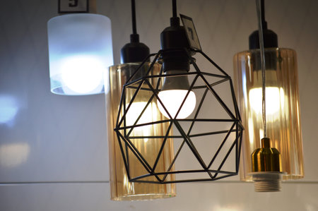 Vintage style light bulbs on the ceiling in the room. Retro style.