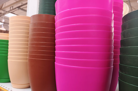 Plastic flower pot on shelf in the store, closeup of photo