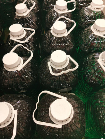 Plastic bottles in a supermarket, closeup of photoの写真素材