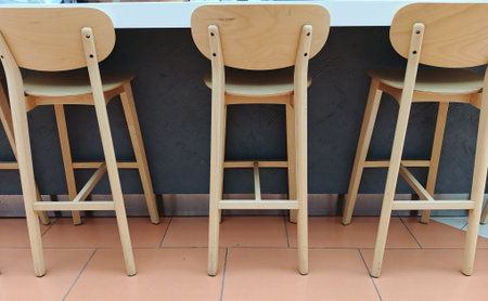 Wooden bar stools in coffee shop cafe, stock photo imageの写真素材