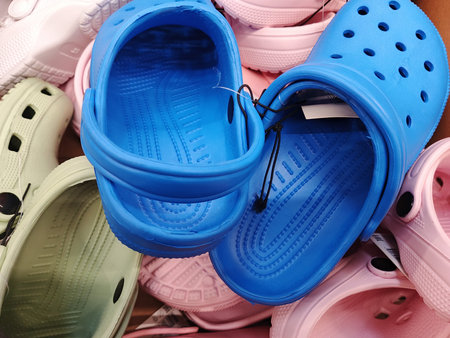Rubber slippers on sale in a store, close-up