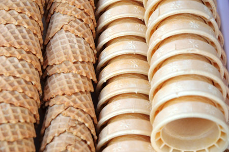Ice cream cones in a row, close-up, selective focus