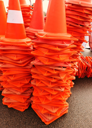 Orange traffic cones. Close up of orange traffic cones.の写真素材