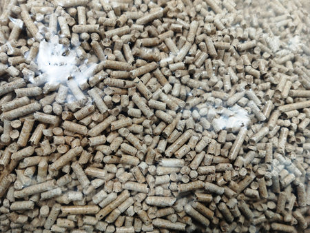 Pile of pellets for animal feed, close-up, background
