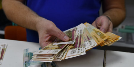 Close-up of male hands counting money. Businessman counting money.