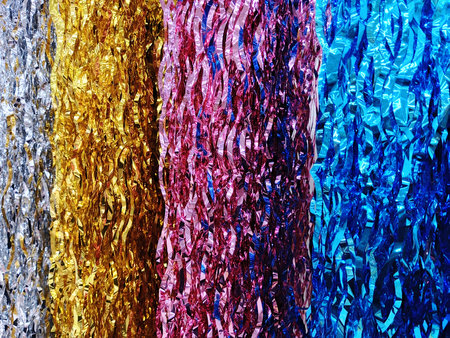 colorful tinsel background, close up of colorful tinsel textureの写真素材