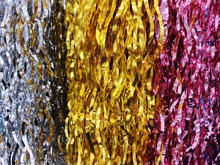 Colorful tinsel as a background. Close-up image.