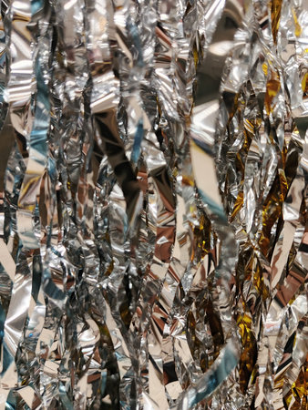 abstract background of a lot of silver ribbons close-upの写真素材