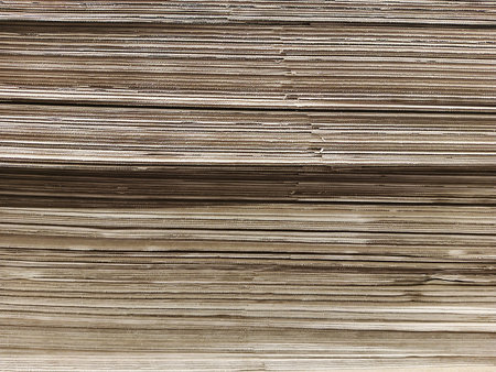 close up of a stack of hardcover books, can be used as backgroundの写真素材