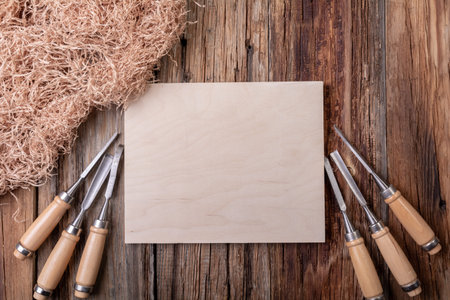 Carpentry, wooden background. Tools under a wooden Board.