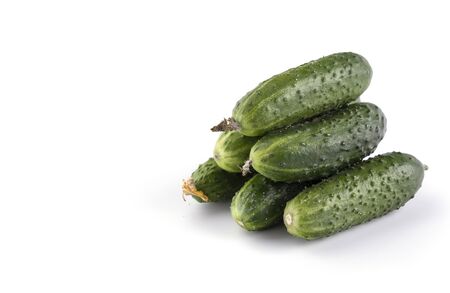 ripe cucumbers on a white isolated background, free spaceの写真素材
