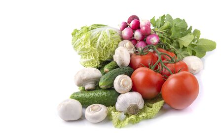 fresh mouthwatering vegetables on a white isolated background, a place for text, a close-upの写真素材