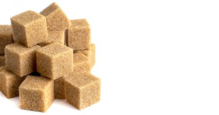 The stairs are made of dark sugar cubes,close-up isolated on white background,free spaceの写真素材