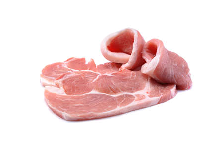 Raw sliced pork steak isolated on a white background.selective focusの写真素材