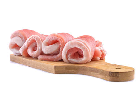 Raw sliced pork steak isolated on a white background.selective focusの写真素材