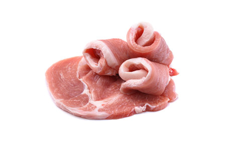 Raw sliced pork steak isolated on a white background.selective focusの写真素材