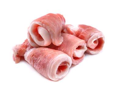 Raw sliced pork steak isolated on a white background.selective focusの写真素材