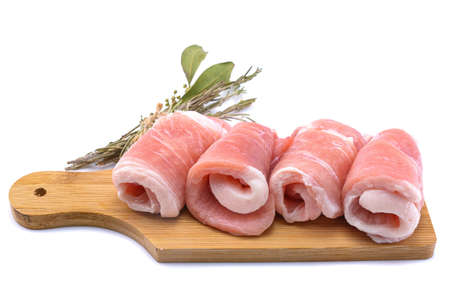 Raw sliced pork steak isolated on a white background.selective focusの写真素材
