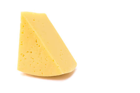 Solid yellow gouda cheese, close-up, isolated on a white background.selective focus. close-up.の写真素材