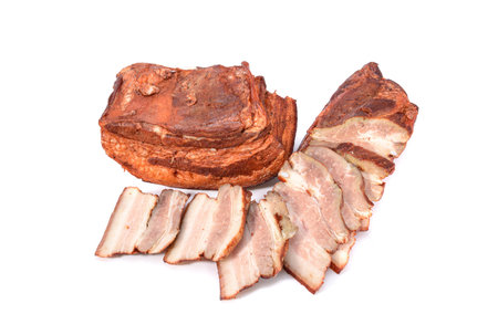Pork fat.A piece of homemade boiled brisket with meat layers is isolated on a white background.horizontal view.の写真素材