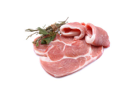 Raw sliced pork steak isolated on a white background.selective focusの写真素材
