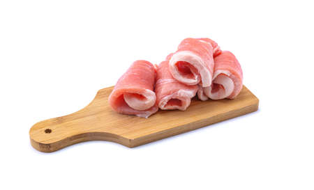 Raw sliced pork steak isolated on a white background.selective focusの写真素材