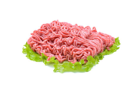Fresh pork and beef minced meat, garnished with garlic, red pepper and dill.Isolated on a white background.horizontal viewの写真素材