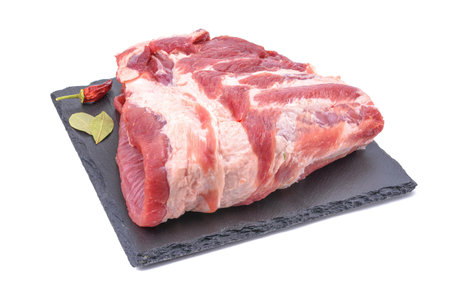 Raw pork ribs are isolated on a white background. Selective focus.の写真素材