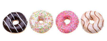 glazed donuts with bright colored sprinkles, isolated on a white background.の写真素材