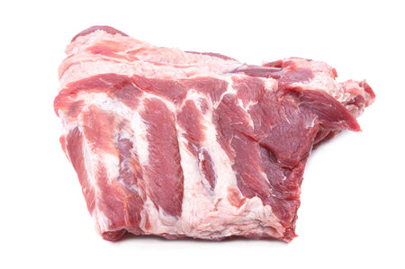Raw pork ribs are isolated on a white background. Selective focus.の写真素材