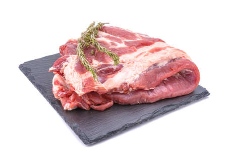 Raw pork ribs are isolated on a white background. Selective focus.の写真素材