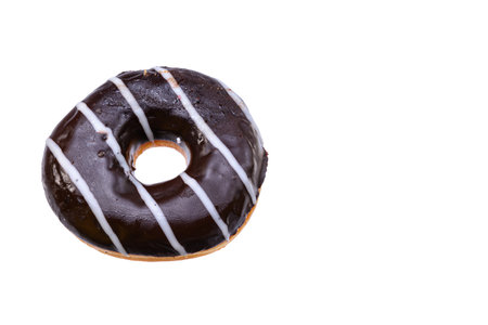 glazed donut with chocolate icing, isolated on a white backgroundの写真素材