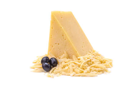 A piece of hard yellow cheese with olives, close-up, isolated on a white background.selective focus.の写真素材