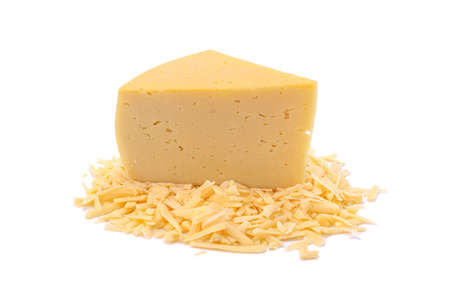 A piece of hard yellow cheese with olives, close-up, isolated on a white background.selective focus.の写真素材