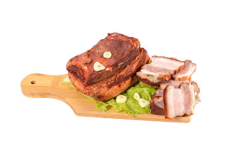 Pork fat.A piece of homemade boiled brisket with meat layers is isolated on a white background.horizontal view.の写真素材