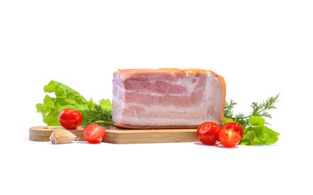 Smoked pork belly, bacon, ham on a wooden chopping board. White isolated background.の写真素材