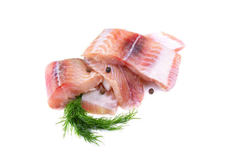 Pangasius fish fillet, pieces decorated with a sprig of dill. Isolated on a white background. Fresh fish filletの写真素材