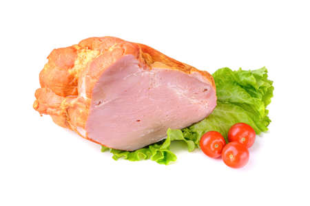 Smoked meat in a large piece on top with cherry tomatoes. Isolated on a white background.の写真素材