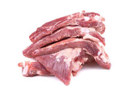 Raw pork ribs are isolated on a white background.Preparation of meat dishesの写真素材