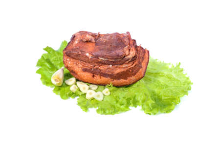 Pork fat.A piece of homemade boiled brisket with meat layers is isolated on a white background.horizontal view.の写真素材