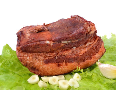 Pork fat.A piece of homemade boiled brisket with meat layers is isolated on a white background.の写真素材