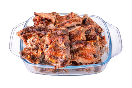 meat fried on coals in a glass cup isolated on a white background.pork ribs.selective focus.の写真素材