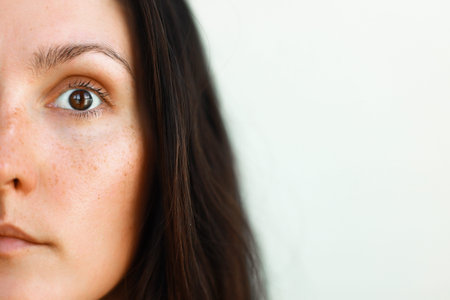close up portrait of a woman half face