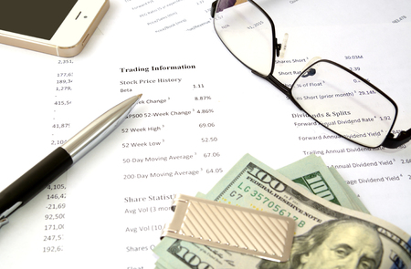 money financial report numbers, trading information smartphoneの写真素材