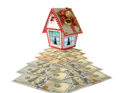 Dollar trail to house isolated over whiteの写真素材