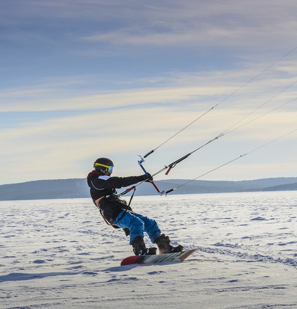 Cool Winter sport. Snowkiting on lake Baikalの写真素材